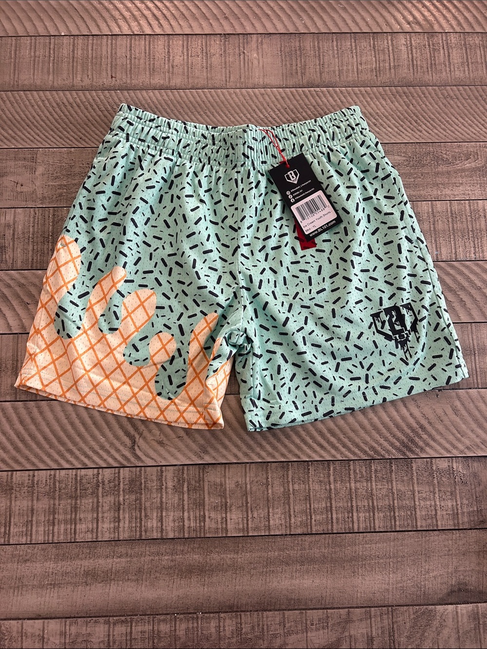Kids' Mint Graphic Casual Swim Shorts with Orange Accent